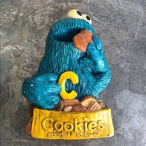 Cookie Monster eating cookies wall hanging